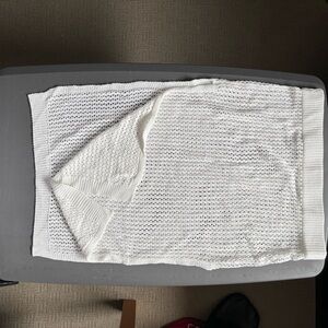 Women’s white knit skirt and crop top set